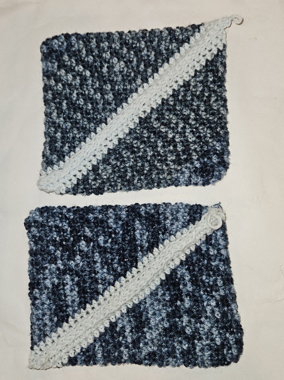Handmade Crochet Oven-Potholders in Navy and Light Blue.